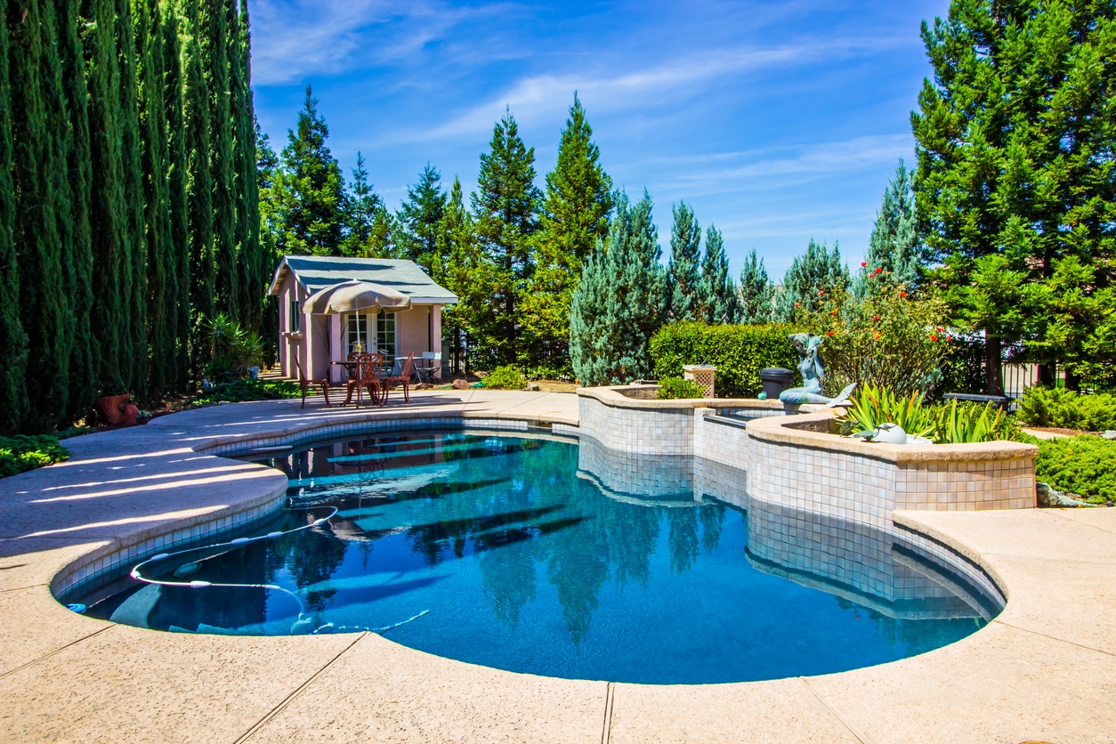 Tranquil Rear Yard Setting With Swimming Pool Custom pool